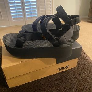 Never worn with box Teva platform sandals!